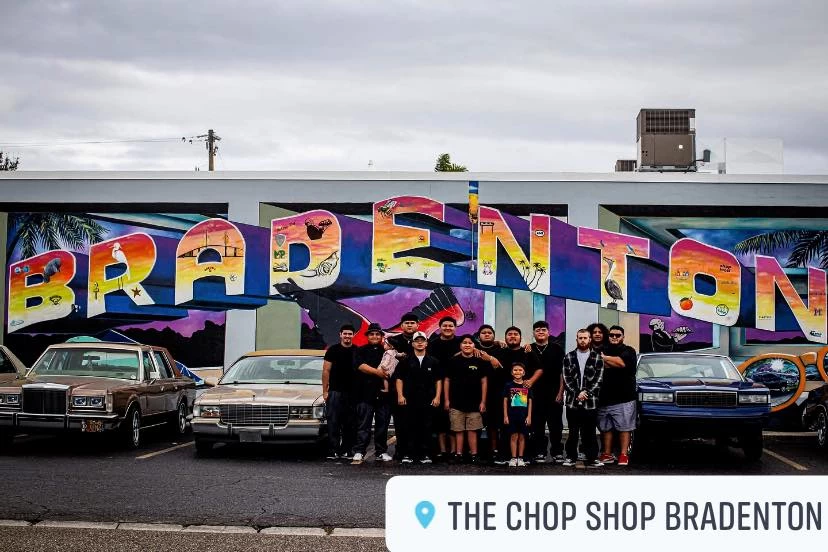 people gather at the dope wall aka The Bradenton Mural